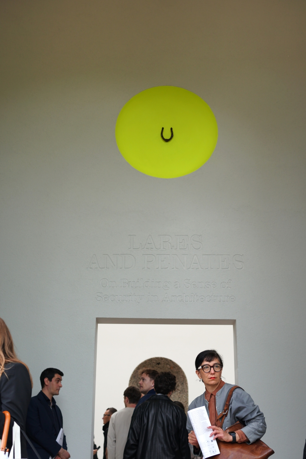 Group of visitors at the “Lares and Penates” exhibition