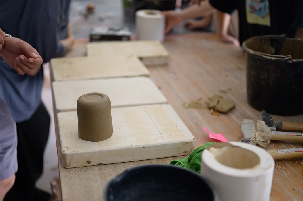 Clay lying on a board on a work table