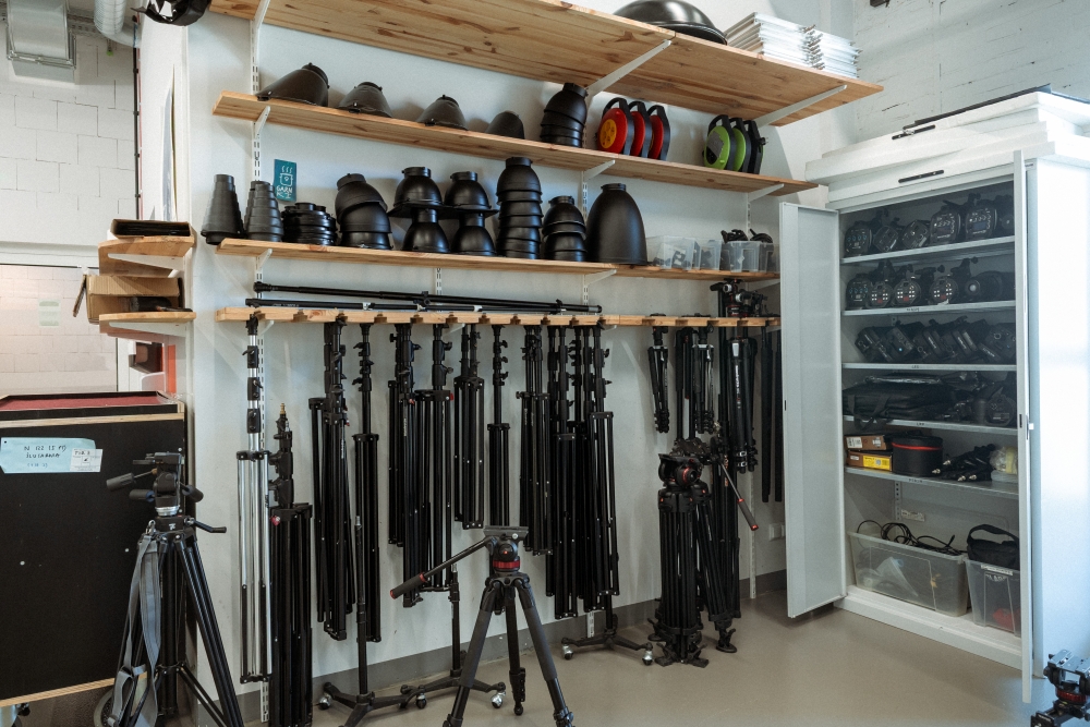 Camera tripods and lenses.