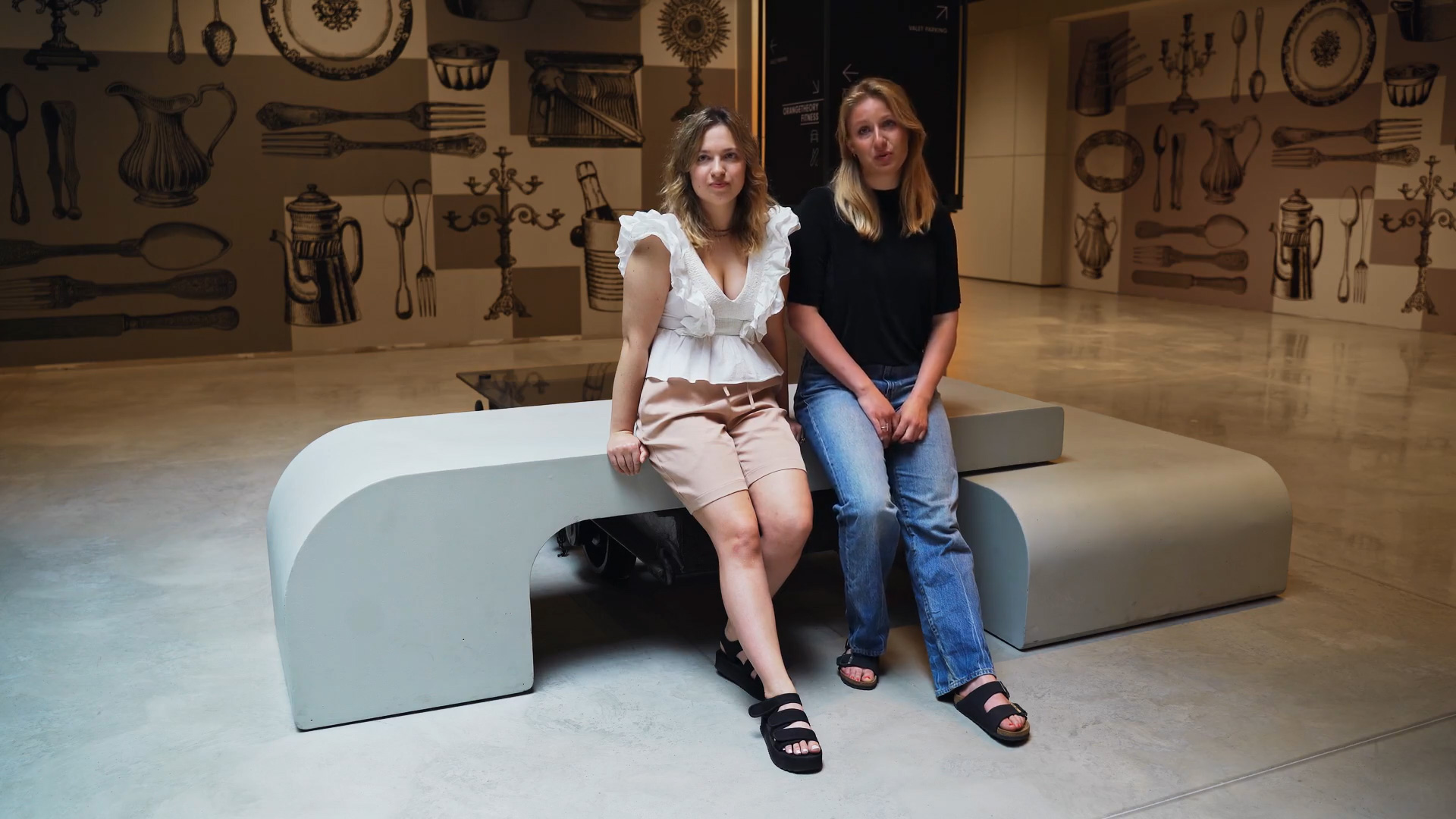 Hania Stankiewicz and Sofiia Nizhibetska, students of the School of Form, on the bench they designed at the Norblin Factory | Screenshot from a video produced by Mediafresh for the Norblin Factory